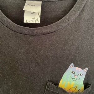 rainbow cat with middle finger in pocket shirt from Rip & Dip